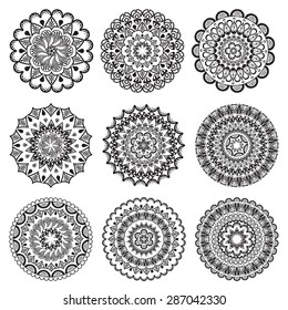 A set of beautiful mandalas and lace circles. Vector illustration