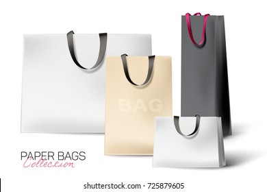 Set of beautiful, realistic shopping bags. Paper texture and silk handles. Different size and colors bags