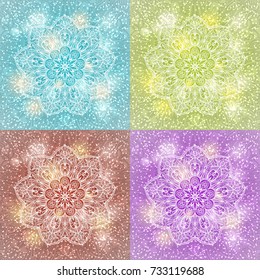 Set of beautiful vector diwali greeting card designs. Creative and artistic mandala tattoo design on light blue background with shining lights and bokeh effect. Glaring Christmas snowflake pattern.
