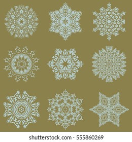 Set of beautiful vector snowflakes isolated on a neutral background. Snowflakes, snowfall, doodles, abstract. Falling Christmas stylized snowflakes.