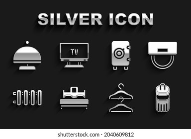 Set Bedroom, Bellboy hat, Trash can, Hanger wardrobe, Heating radiator, Safe, Covered with tray and Smart Tv icon. Vector