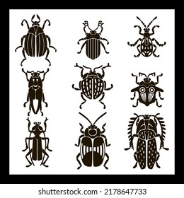 Set beetles are black on a white background. The Outline Of An Insect-Beetle. Beetles in a black fill outline on a white background. 