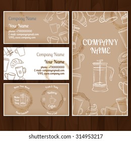 Set of beige and white business card templates with hand-drawn coffee cups on brown wooden background vector illustration