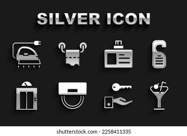 Set Bellboy hat, Please do not disturb, Martini glass, Hotel door lock key, Lift, Identification badge, Electric iron and Toilet paper roll icon. Vector