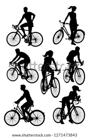 A set of bicycle cyclists riding their bikes in silhouette 