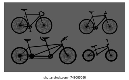 Set of bicycles isolated on a gray background.