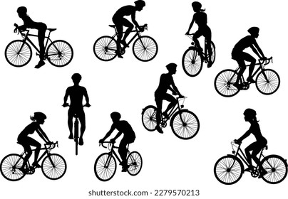 A set of bicyclists riding bikes and wearing a safety helmet in silhouette