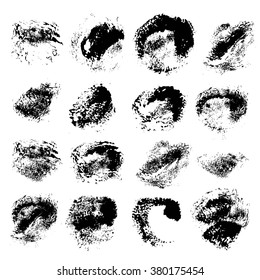Set of big black paint textured prints isolated on a white background
