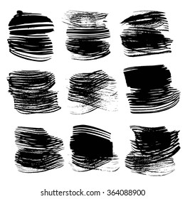 Set of big black textured strokes isolated on a white background
