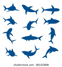 Set of big sharks blue silhouettes. Vector illustration.