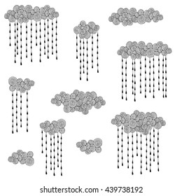 Set of big and small abstract clouds with rain drops for kids. Isolated design elements. Hand drawn vector black and white illustrations. Childish doodle.
