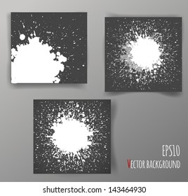 Set of big white splashes on black background. Vector illustration.