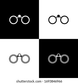 Set Binoculars icon isolated on black and white background. Find software sign. Spy equipment symbol. Vector Illustration