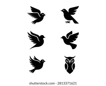 Set of bird silhouettes including flying birds and owl head
