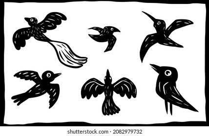 Set of birds in woodcut style.
