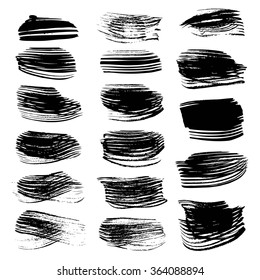 Set of black abstract textured strokes isolated on a white background