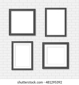 Set of black blank realistic frames on the white brick wall mockup