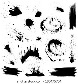 Set of black blots and ink splashes. Abstract elements for design in grunge style. 