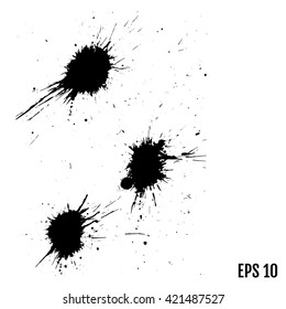 Set of black blots on the white background. Ink stains.
