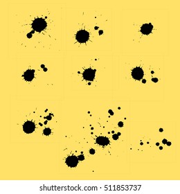 Set of black blots on the yellow background. Ink stains.