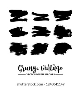 Set of black brush stroke and texture. Grunge vector abstract hand - painted element. Underline and border.