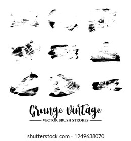 Set of black brush stroke and texture. Grunge vector abstract hand - painted element. Underline and border.