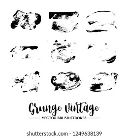 Set of black brush stroke and texture. Grunge vector abstract hand - painted element. Underline and border.