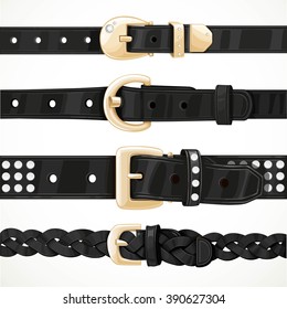 Set of black buttoned to buckle belts isolated on white background