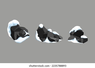 A set of black charcoal of various shapes in the snow.Collection of pieces of coal, graphite, basalt and anthracite. The concept of mining and ore in a mine.Rock fragments and boulders.