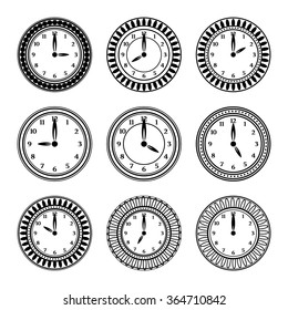 Set of black clocks on white background