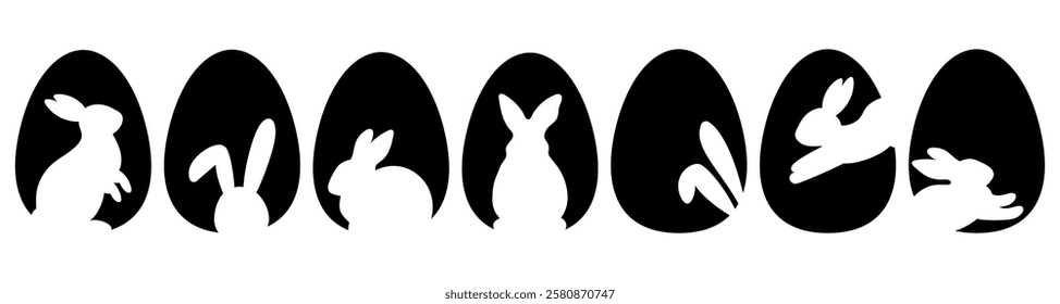 Set with black eggs and bunny silhouettes. Easter egg shape with bunny silhouette - traditional symbol of holiday. Easter rabbit inside egg.