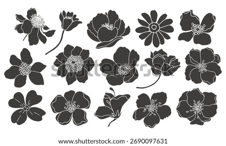 Set of black flower silhouettes. Hand-drawn floral design. Vector illustration