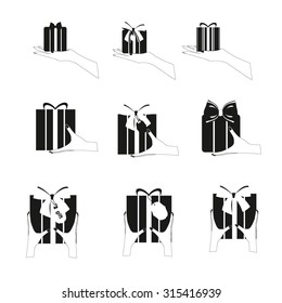 Set of black gift box in hands. Present shipping vector icons collection. Present box vector set. Gift box black vector set.