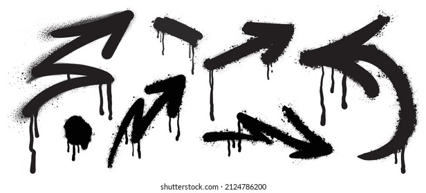 Set of black graffiti spray. Collection of arrow, dot and ink paint design with spray texture and stencil pattern. Elements on white background for banner, decoration, street art and ads.