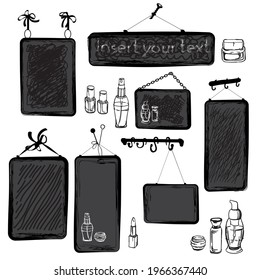 A set of black and gray chalk boards of various shapes for writing with chalk. The boards are hung on various hooks and nails. Cosmetic bottles, creams, lipsticks. Stylish black and white graphics