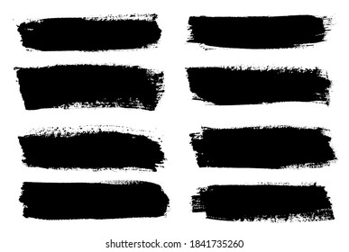 Set of black grunge brush strokes.