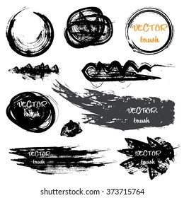 Set of black grunge brushes and design elements. Vector