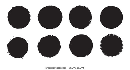 Set of black grunge circles shapes on a white background. Paint brush stamp collection.