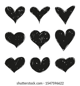 Set of black grunge hand drawn hearts. Vector collection of unevenly colored hearts for Valentines Day sweethearts.