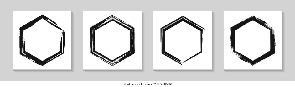 Set of black grunge hexagonal frames with paint strokes.