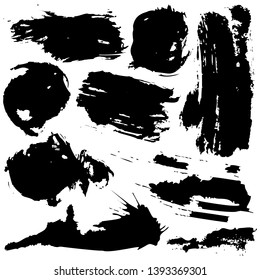 Set of black grunge ink blobs - vector.