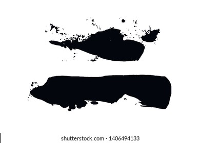 Set of black grungy hand painted brush strokes isolated on white.