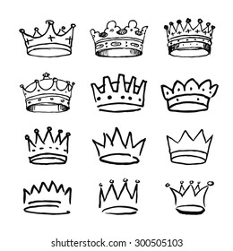 Set of black hand drawn crowns. Vector Illustrations.