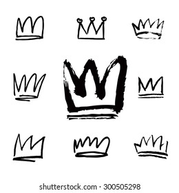 Set of black hand drawn crowns. Vector Illustrations.