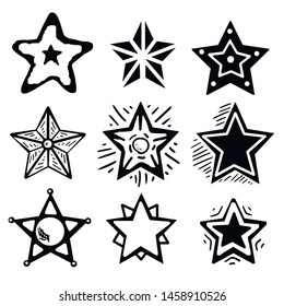 Set of black hand drawn doodle stars. star icon on white background. vector illustration
