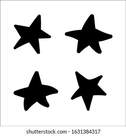 Set of black hand drawn doodle stars.