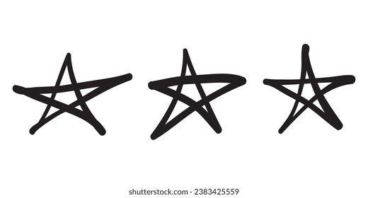 Set of black hand drawn doodle stars in isolated on white background.
