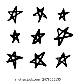 Set of black hand drawn vector stars in doodle style on white background. Star doodles are drawn with ink. Brush marker schematic