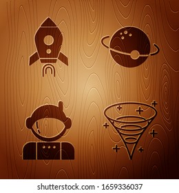 Set Black hole, Rocket ship with fire, Astronaut and Planet on wooden background. Vector