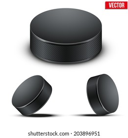 Set of Black Ice Hockey pucks. Vector Illustration. Isolated on white background.